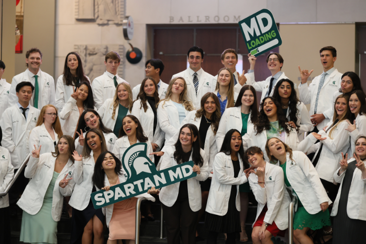 A group of incoming students at the white coat ceremony.